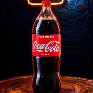 Refrigerante de cola 2 litros.